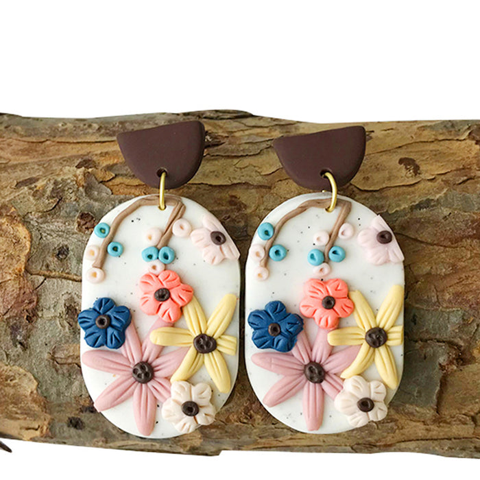 Elegant Geometric Floral Clay Earrings - Handcrafted with Delicate Detailing