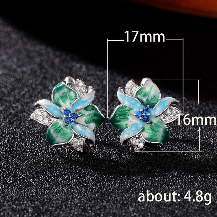 Pendientes de flores esmaltadas con pegamento en forma de gota y clips de circonitas