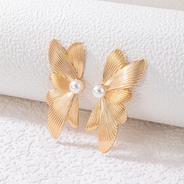 Pearl inlaid butterfly earrings geometric irregular alloy earrings