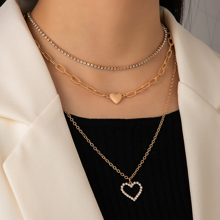 Collar de corazón hueco de triple capa con diamantes de imitación: estilo hip hop de moda