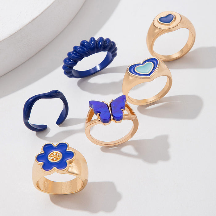 Juego de seis anillos con diseño de mariposa y flores pequeñas y lindas con gotas de aceite