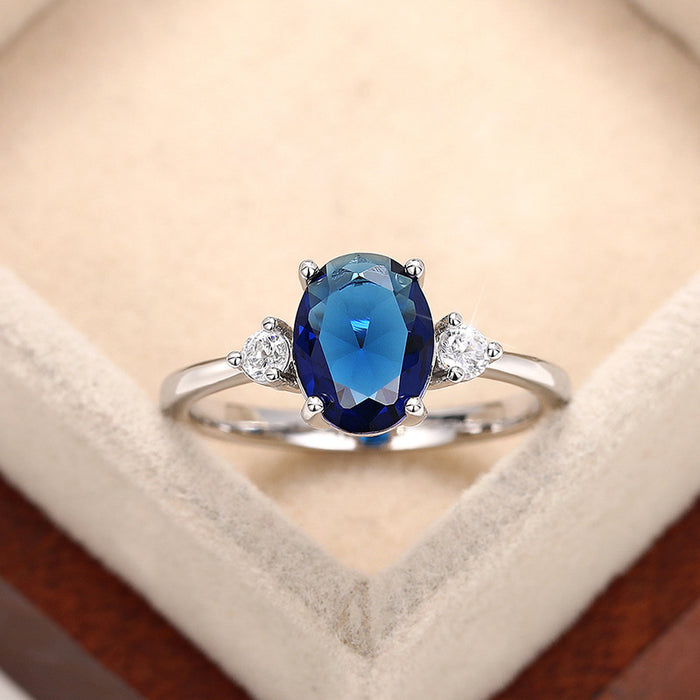 Anillo de piedra preciosa azul con forma de huevo con incrustaciones, joyería de temperamento noble