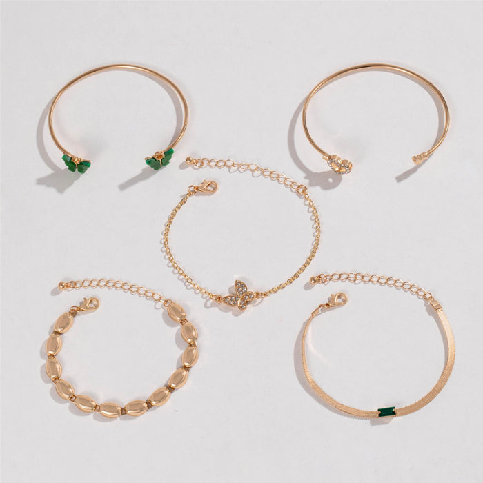 Conjunto de brazalete abierto con corazón de mariposa y diamantes de imitación de lujo: joyería francesa con esmeraldas falsas