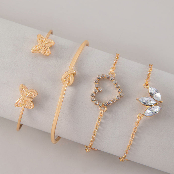 Luxe Heart and Leaf Bracelet with Butterfly Knot – Four-Layer Elegant Jewelry