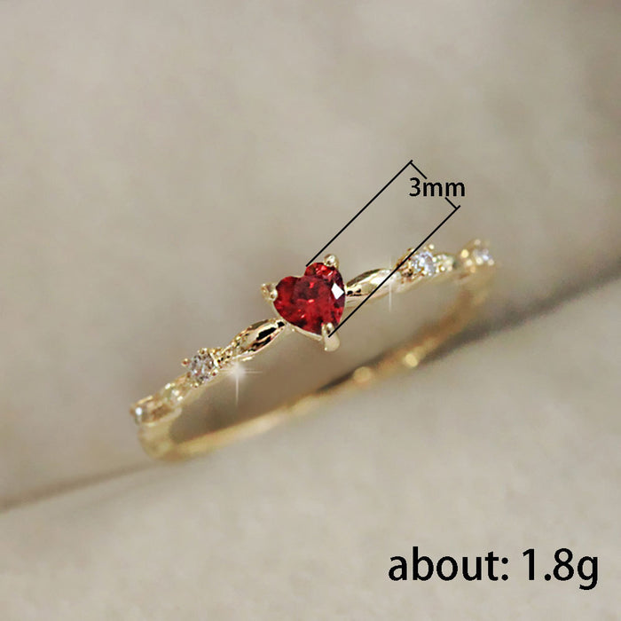 Red zircon heart-shaped index finger ring