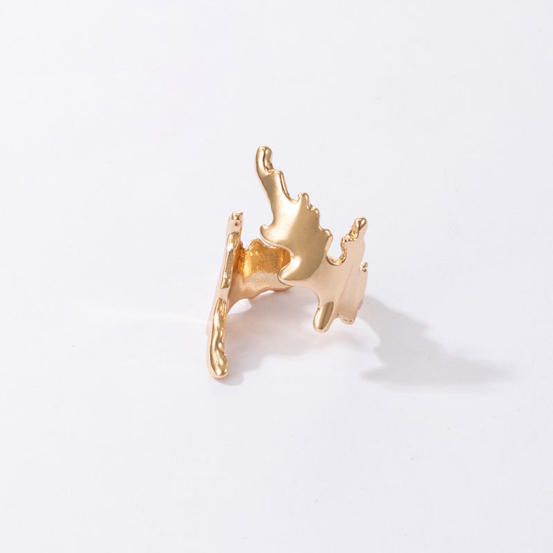 Irregular geometric gold ring with leaf opening