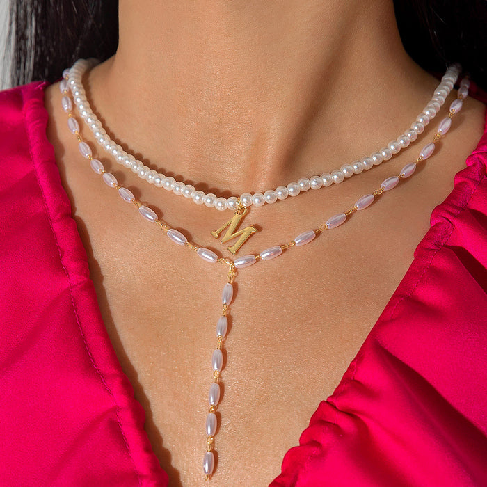 Multi-Layered Pearl and Heart Pendant Necklace