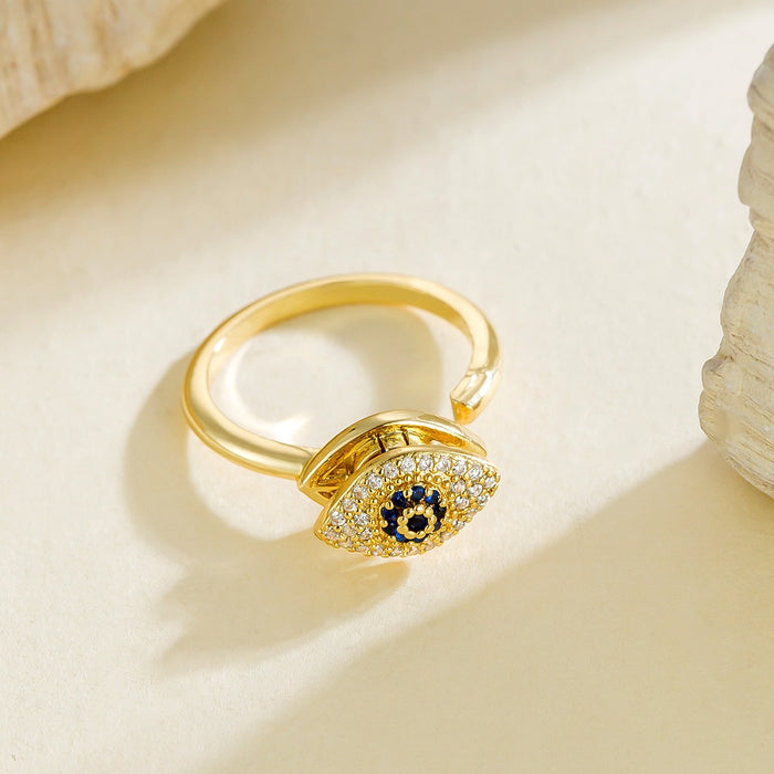 Wholesale diamond-encrusted blue-eyed evil eye rotating ring