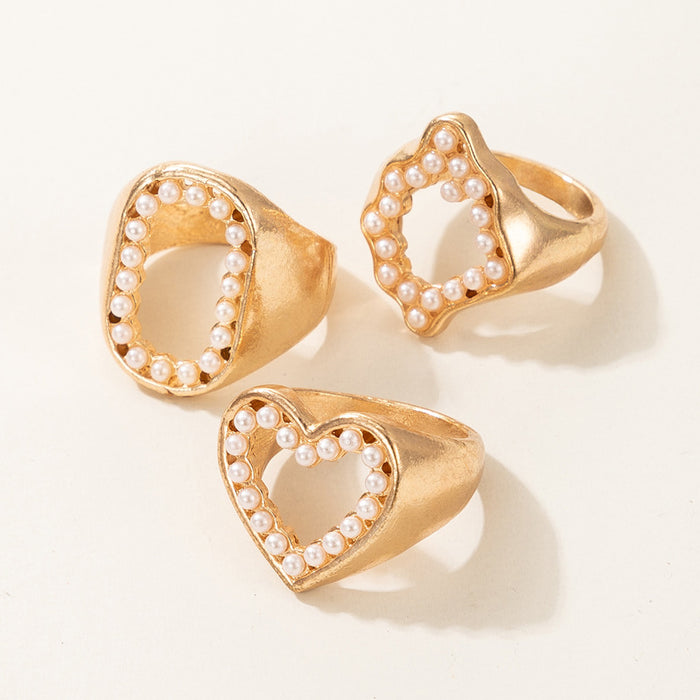 Hollow pearl inlaid irregular geometric O letter ring