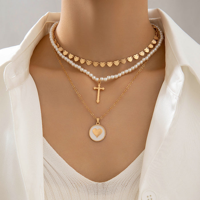 Heart Pendant Necklace with Cross and Pearl Charms - Geometric Multilayered Jewelry for Women