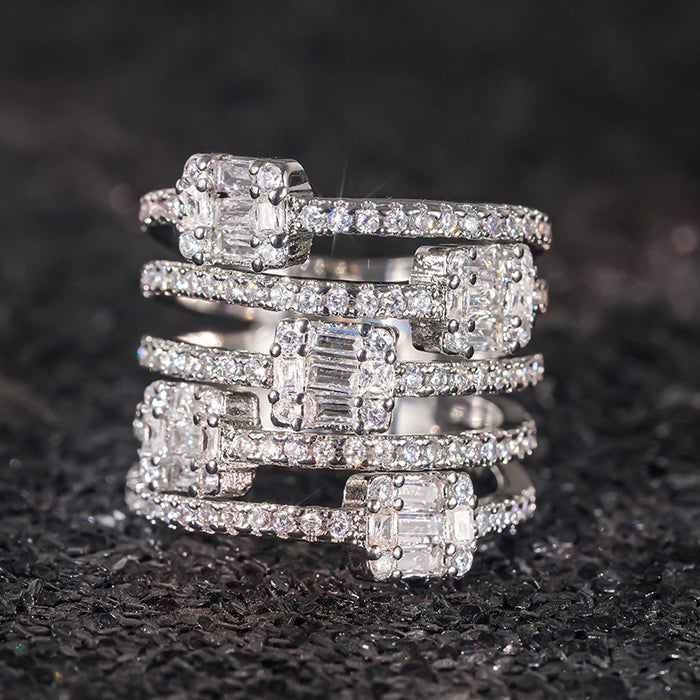 Women's multi-layered ring with micro-set half-circle diamonds