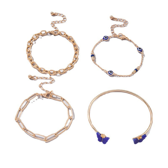 Conjunto de pulseras de mariposas azules galvanizadas: joyería de aleación de cuatro piezas para mujeres