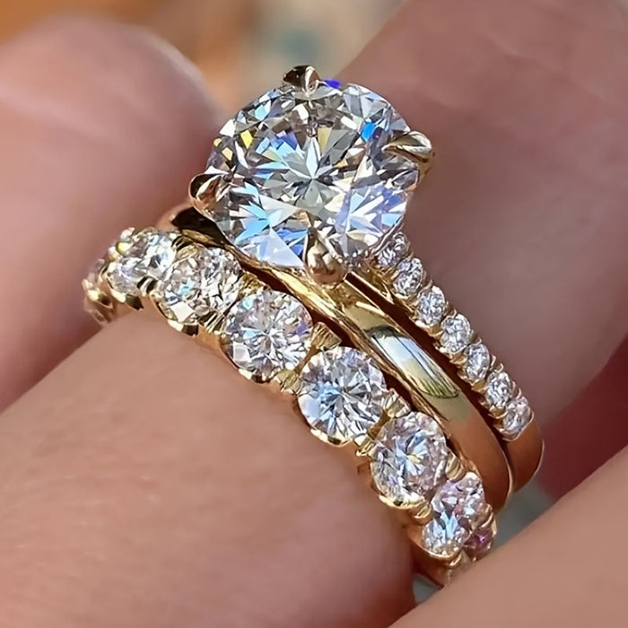 Anillo elegante de tres piezas con incrustaciones de circonitas a juego para bodas