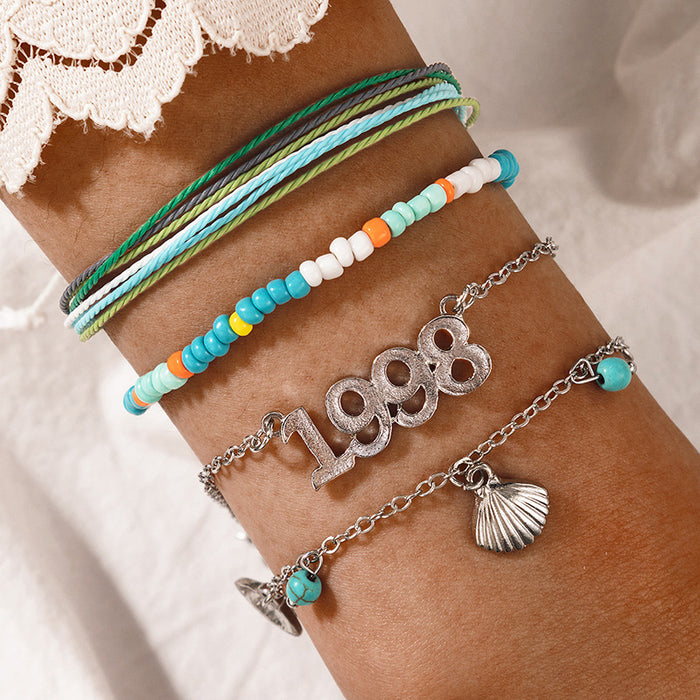 Conjunto de pulseras de cuerda de metal: colección de pulseras trenzadas con letras esmaltadas Daisy