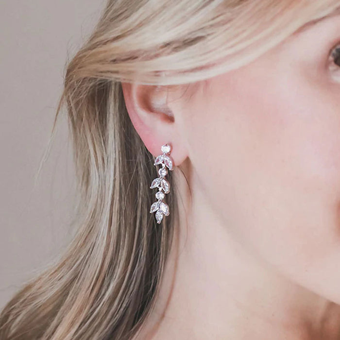 Diamond leaf tassel earrings