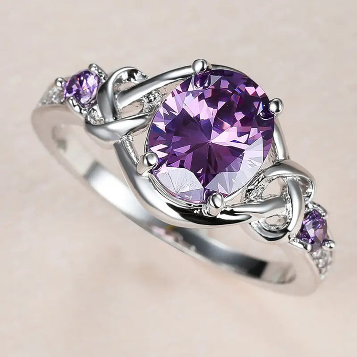 Anillo de princesa morado con incrustaciones Anillo de bobinado ovalado europeo y americano