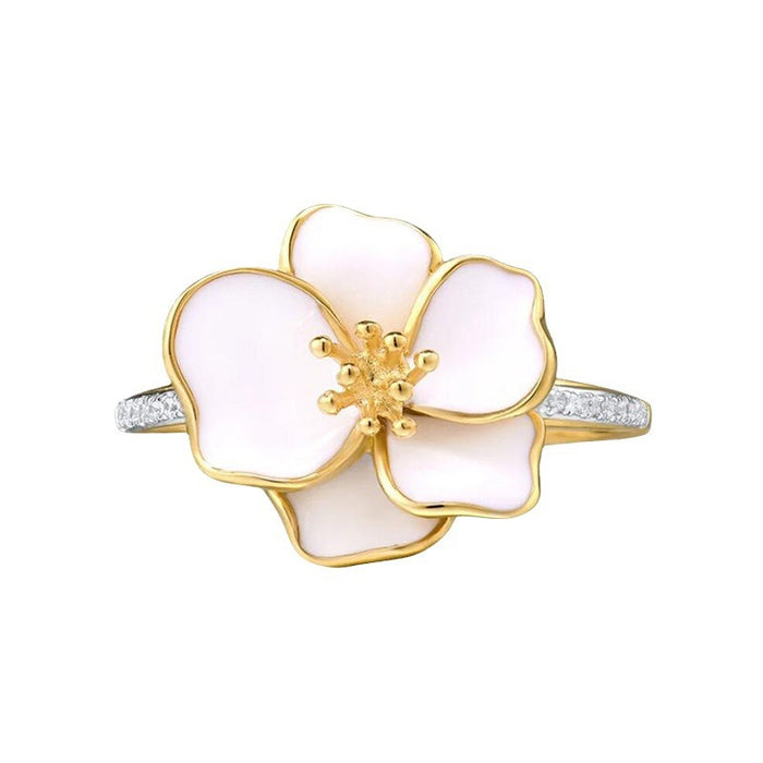 Anillo con flores microincrustadas de camelia