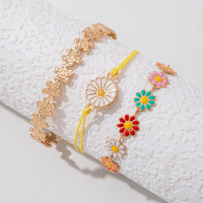 Conjunto de pulseras con flores de margaritas: joyería de mujer en tres piezas en tonos pastel