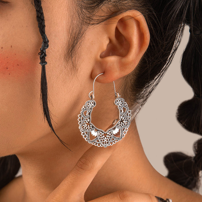 Retro ethnic style hollow flower earrings versatile carved earrings