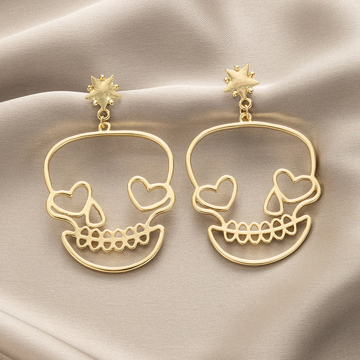 Funny Halloween golden skull face earrings