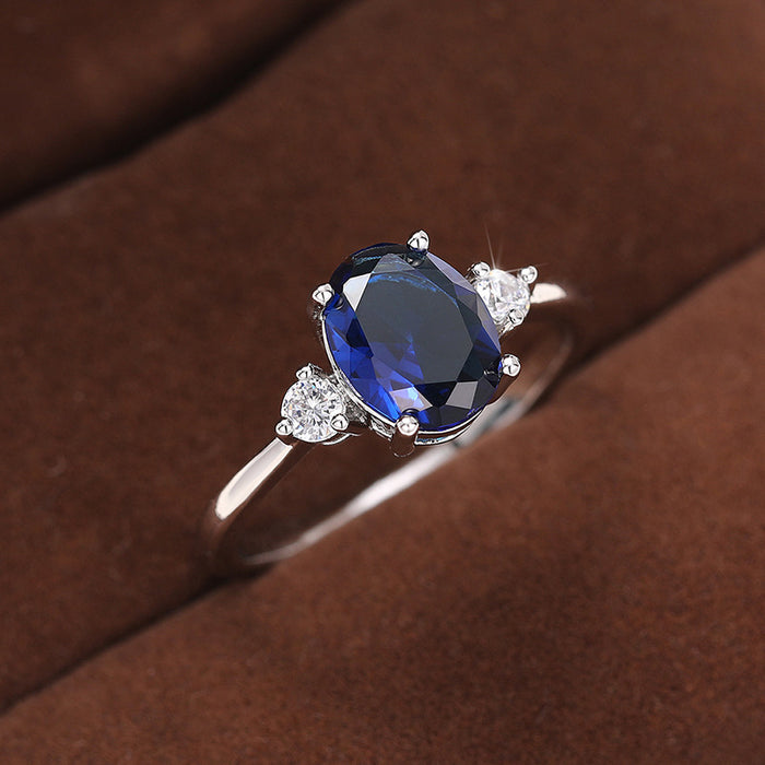 Anillo de piedra preciosa azul con forma de huevo con incrustaciones, joyería de temperamento noble