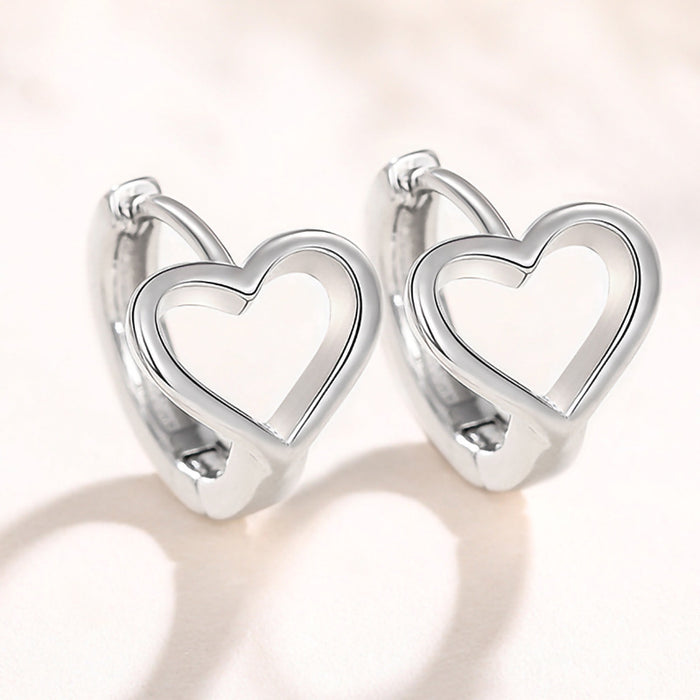 Korean style temperament ear clip heart earrings hollow metal sweet earrings for women