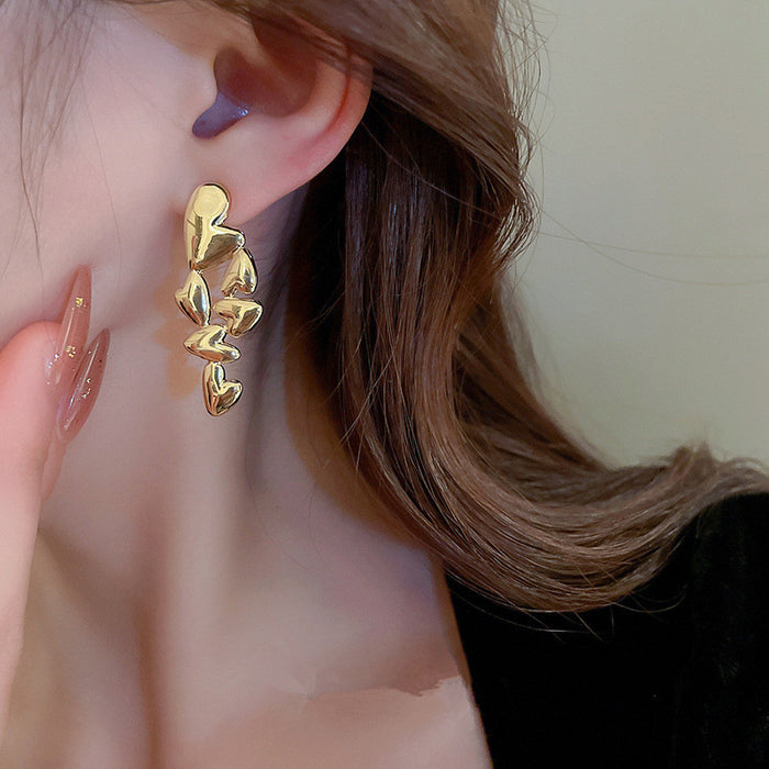 Irregular metal earrings heart design shiny earrings