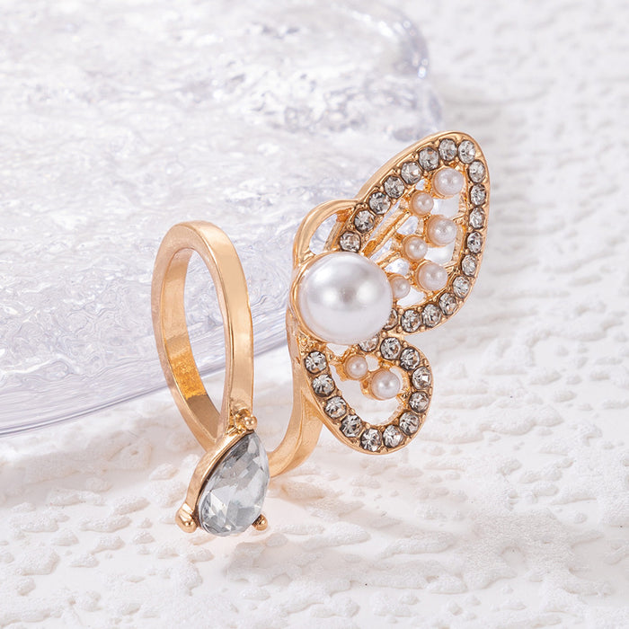 Exaggerated light luxury pearl diamond butterfly ring geometric hollow open single ring