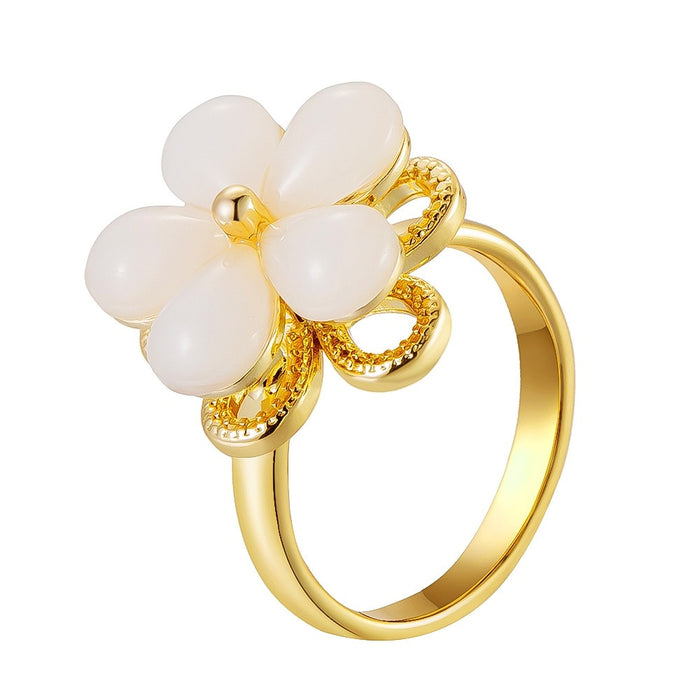Wholesale cat's eye five-petal flower rotating ring