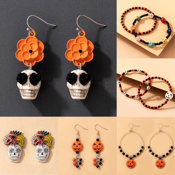 Pendientes de cuerda elástica con cuentas de arroz de colores y calaveras de Halloween