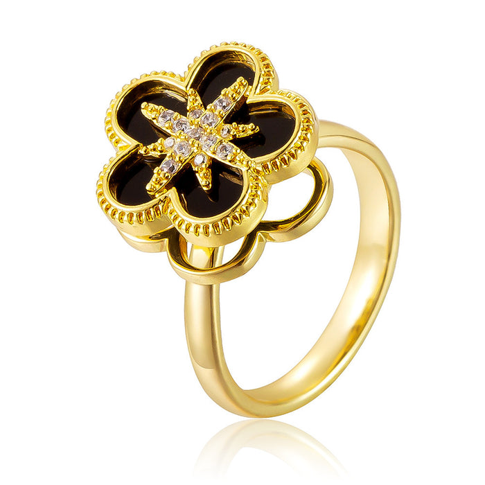 Wholesale black eight-pointed star five-petal flower rotating open ring