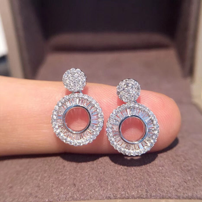 Venta al por mayor de pendientes de circonitas y diamantes con diseño de nicho