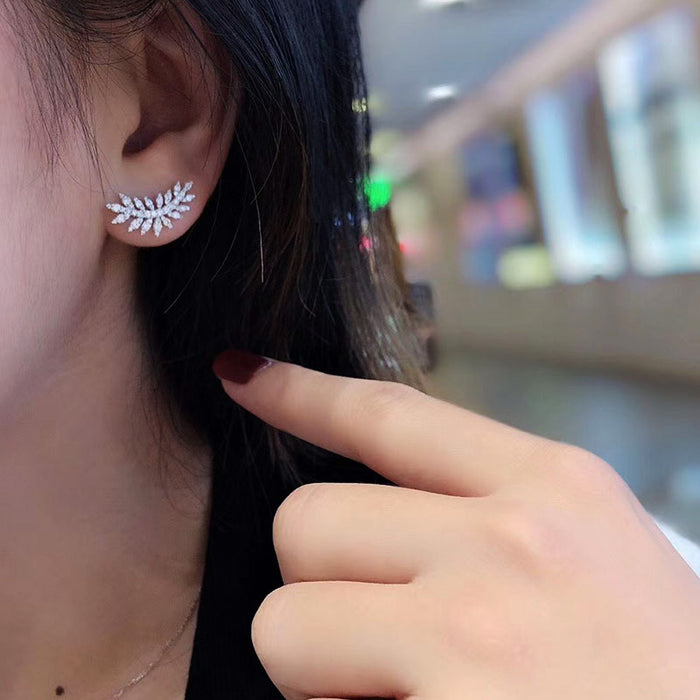 Pendientes vintage de plumas y flores
