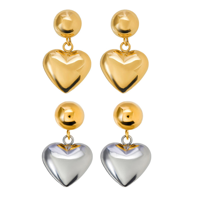 Pendientes asimétricos de acero inoxidable y oro de 18 quilates con forma de corazón: joyas con un diseño único en dos tonos