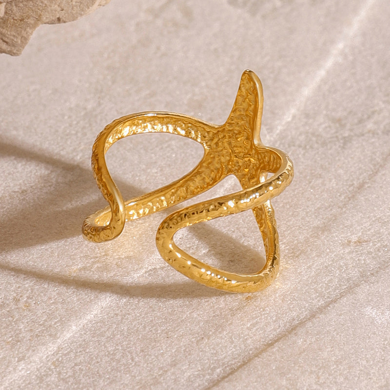Anillo abierto de estrella de mar de acero inoxidable