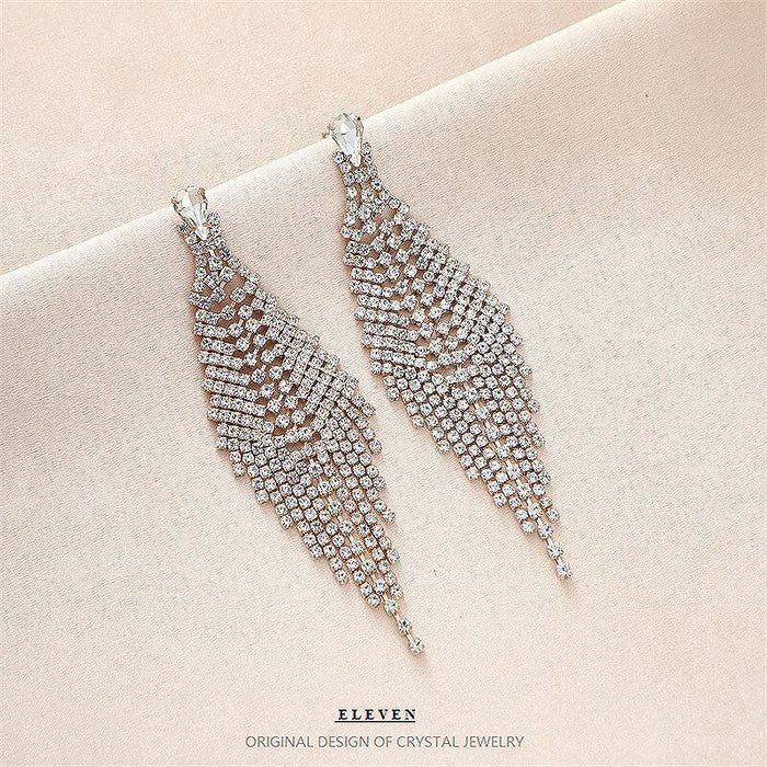 Exaggerated Chain Tassel Earrings - Long Rhinestone Dangles for a Modern Look